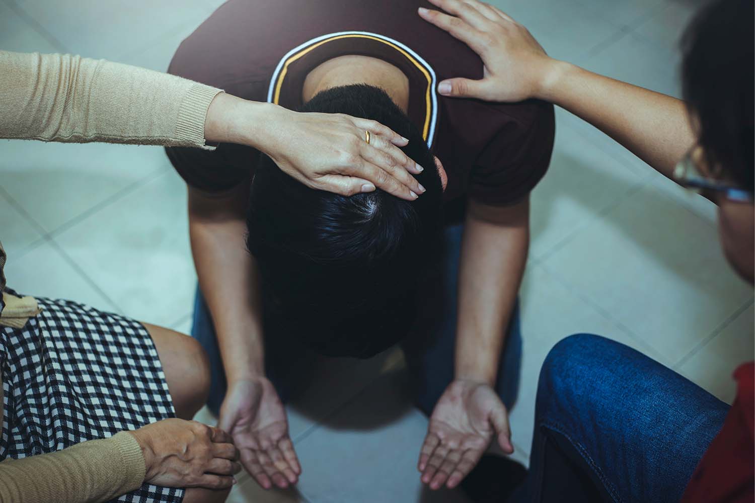 What is “laying on of hands”?