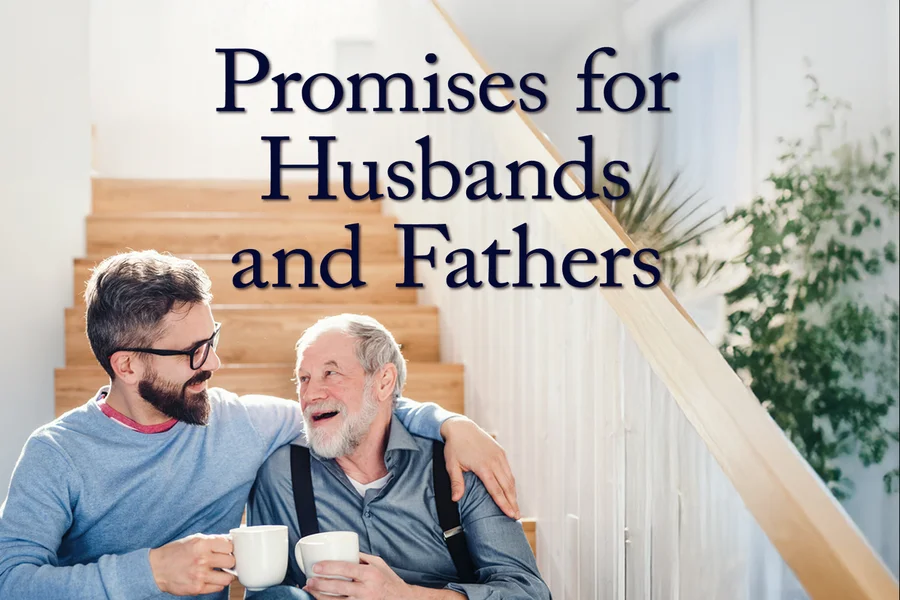 Father and adult son drinking coffee on a staircase at home