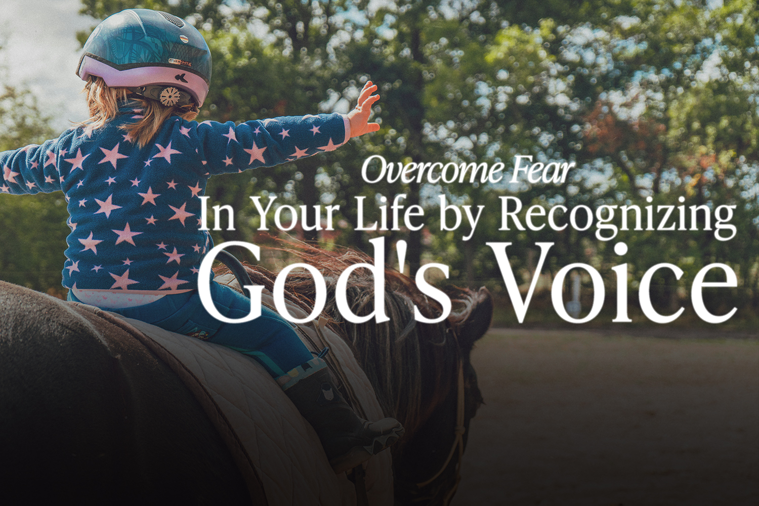 Little girl in a blue coat and helmet riding a brown horse